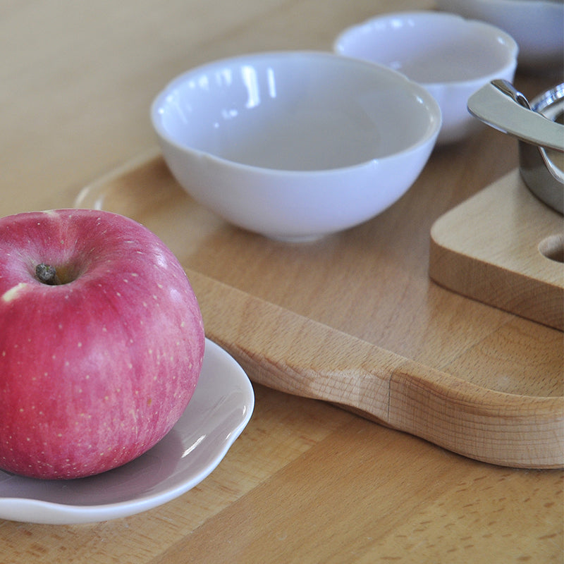 Practical Life Ceramic Cutting an Apple